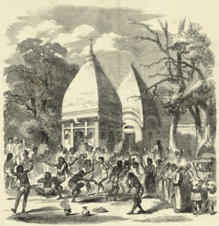 Hindoo hindu  dance  Festival dancers and musicians celebrating in front of a temple