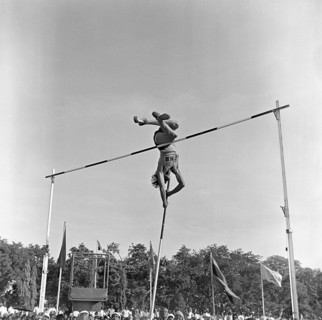 South Asian Indian athlete performing Pole Vault
