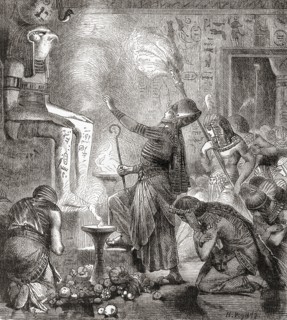 An Egyptian king worshipping the God Horus in a temple