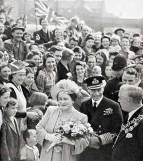 King George VI and Queen Elizabeth on their victory tour of London at the end of WWII in 1945