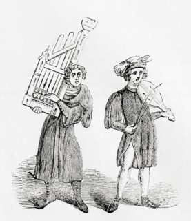 Musicians playing a hand organ or dulcimer and a violin in the Middle Ages