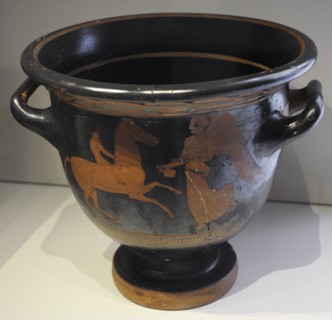 Bell krater depicting a winged Nike offering a libation to a young nude rider