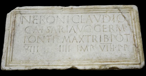 Stone plaque dedicated to emperor Nero (Nero Claudius Caesar Augustus Germanicus)  (37-68 AD) honouring his person and lists his titles: Pontifex Maximus, Tribune, Consul, Emperor and Father of the Ho...