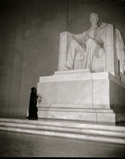 Marion Anderson before a statute of President Lincoln in the Memorial in DC