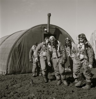 Tuskegee airmen exiting the parachute room, Ramitelli, Italy, March 1945