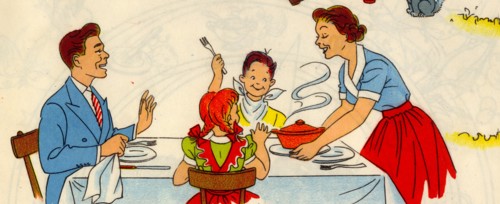 Family at Table as Mom serves hot food