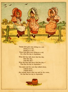 Three girls sit on a fence in September