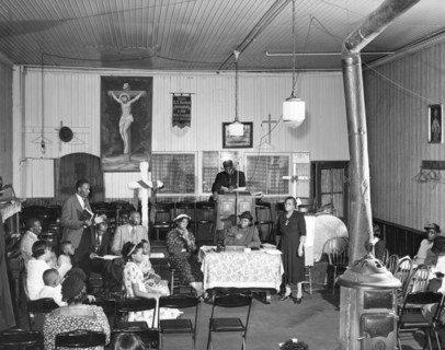 "Storefront" Baptist church during services on Easter morning. Chicago, Illinois
