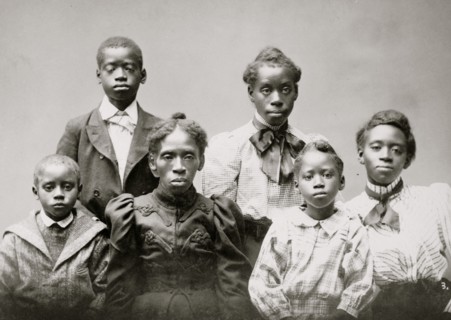 Mrs. Frazer Baker and children, family of the murdered postmaster