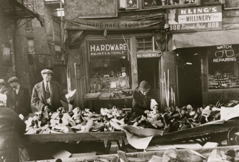 People shopping for shoes at shop on Maxwell Street, Chicago, Illinois