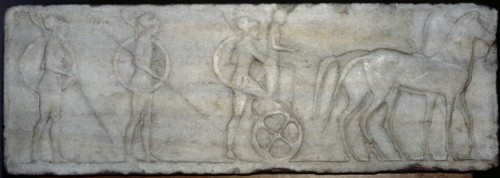 Base of funerary Kouros. Four-horse chariot and hoplites.