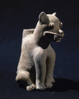 Feline figure.