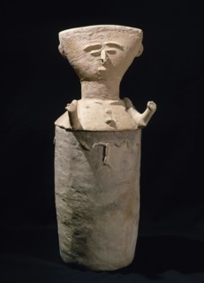 Clay anthropomorphic figure.