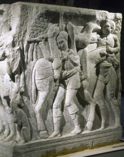 Hippolytus arriving from his hunting party.