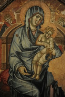 Madonna and Child Enthroned with hagiographical scenes in stamps.