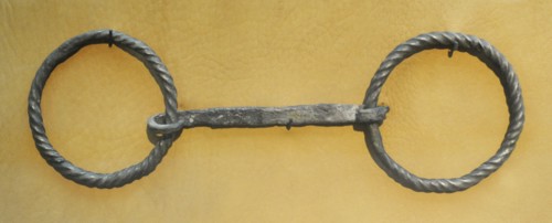 Bit from a bridle of horse.