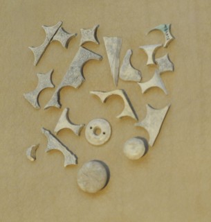 Buttons were cut with a stamp or turned.