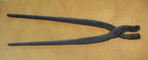 Tongs, hammers and anvil were the main tools of the black-smith.