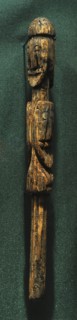 Piece of wood wiht heads.