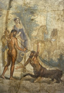 Heracles with Hyllus in arms, looks at the centaur Nessus.