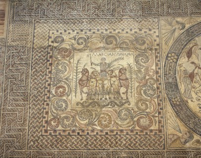 The Aurigas mosaic. 4th century. The victoriuos charioteer Marcianus with his chariot. Merida. Spain.
