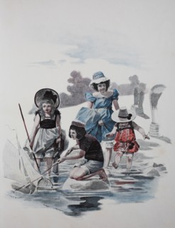 Children play on the beach of the Baltic Sea