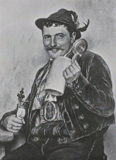 Bavarian man wearing traditional dress and holding a beer mug and a pipe