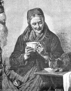 Old woman has poured some milk into the saucer for the domestic cat  /  Alte Frau hat für die Hauskatze etwas Milch in die Untertasse gegossen