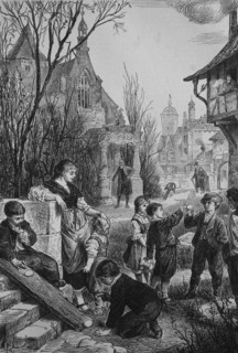 the children playing easter games with easter eggs  /  Die Kinder spielen Osterspiele mit Ostereiern
