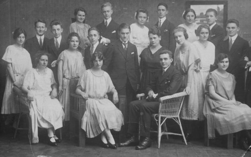 Group photo of an extended family in elegant clothes