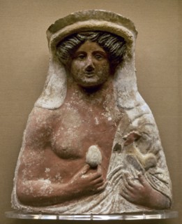 Bust of Dionysos holding an egg and a cock