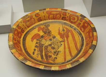 Plate with figurative and geometric decoration