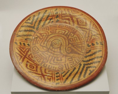 Plate with schematic and geometric decoration