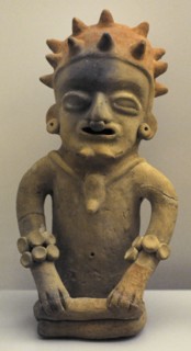 Male figure depicting a dignitary, richly jeweled