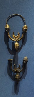 Luxurious temple earrings with crescent-shaped ornament