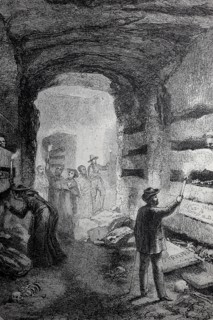 Visitors in the catacombs of Rome