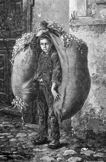 Poor boy as a street hawker