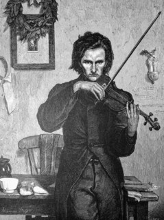 Young man practicing the violin  /  Junger Mann beim Üben des Geigenspiel