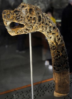 Animal-head post carved in wood