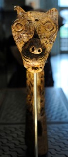 Animal-head post carved in wood