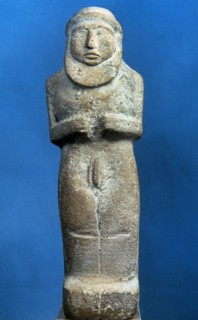 Statuette of a naked bearded man