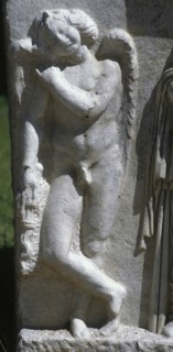 Relief depicting Cupid with torch.