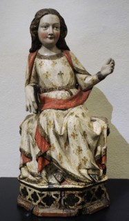 The Virgin Mary enthroned.