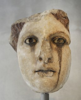 Head of statue. Marble copy of a gold-and-ivory statue, perhaps Aphrodite.