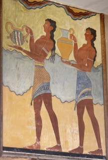 Two young men transporting cups.