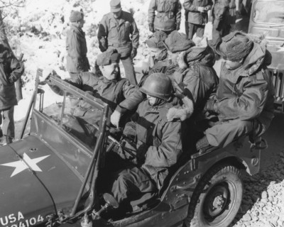 President-elect Dwight D. Eisenhower (front seat, left); General Mark W. Clark, Commander-in-Chief, United Nations Command (back seat, center), and members of their party begin a tour of installations...