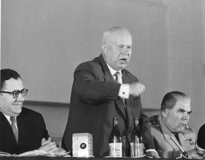 Soviet Premier Nikita Krushchev (center) shakes his fist, as he launches into a bitter tirade at his farewell press conference 5-18-60, after he had attended the Summit conference. At his right is Soc...
