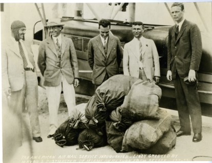 No date - Pan American Air Mail Service inaugurated - Charles A. Lindbergh (far right) greeted by Mayor and Postmaster of Miami on return from Belize.