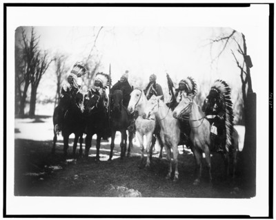 Circa 1900 - Six tribal leaders (l to r) Little Plume (Piegan), Buckskin Charley (Ute), Geronimo (Chiricahua Apache), Quanah Parker (Comanche), Hollow Horn Bear (Brulé Sioux), and American Horse (Ogla...