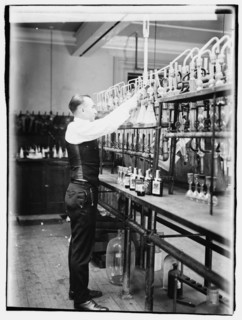 1920 -  Treasury, Internal Rev. Chemist G.F. Beyertesting bootleggers' booze.